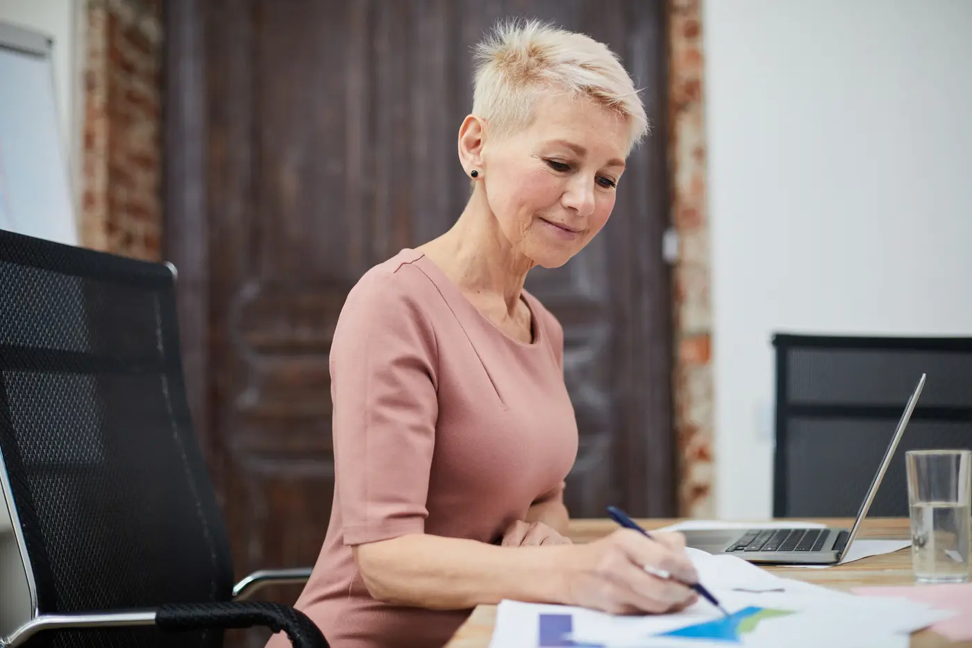 Customer reviewing documents while considering a better-fit printer