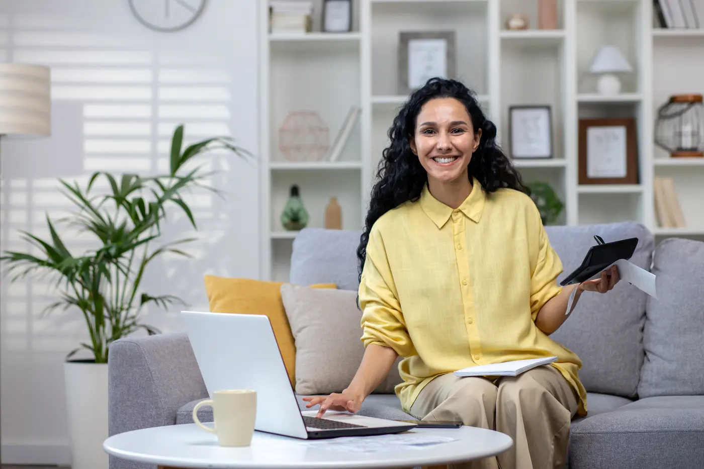 Customer reviewing assisted-purchase options from home