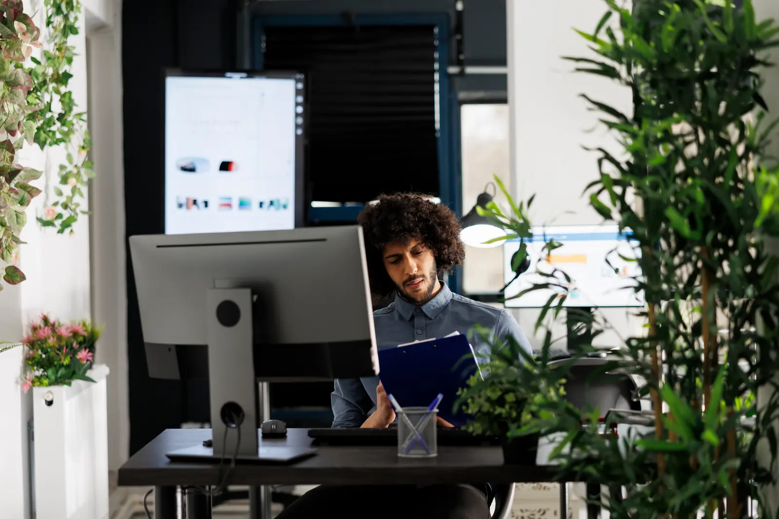 Business team comparing technology in an office