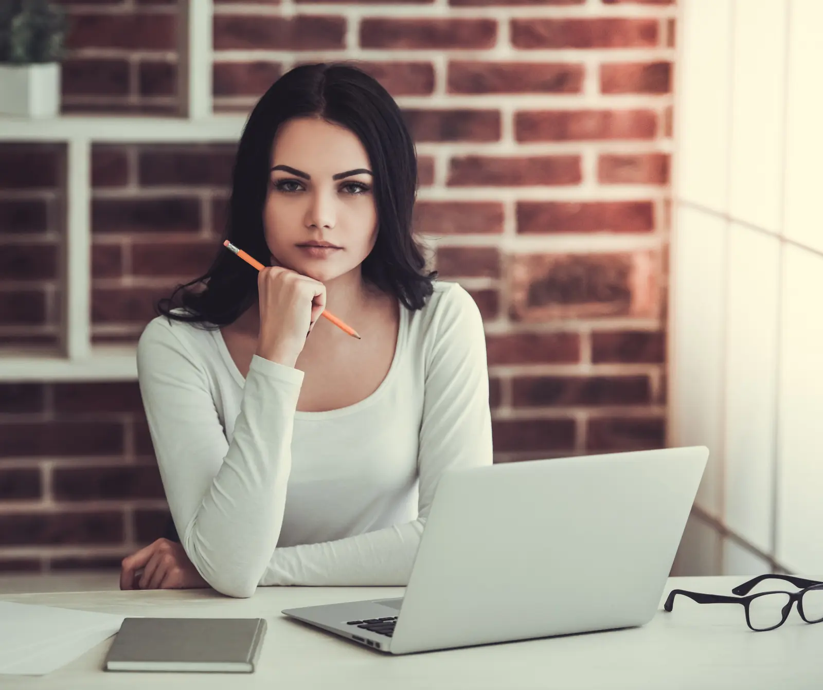 People using computers in a bright professional environment