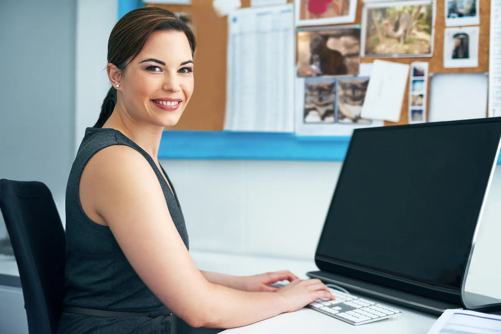 Business team using computers while reviewing technology requirements